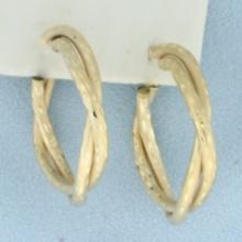 Diamond Cut Satin Finish Twisting Hoop Earrings In 14k Yellow Gold