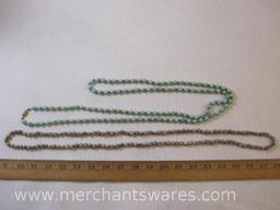 Two Beaded Necklaces, one made with seeds, 2oz