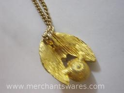 Two Gold Tone and Faux Pearl Necklaces including Leaves and Bee