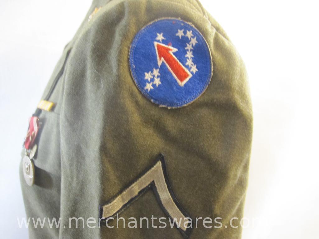 WWII Era Ike Jacket with Ruptured Duck Patch and Various Military Medals and Insignia, Size 36R,