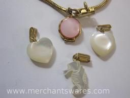 Three Mother of Pearl Pendants and Gold Tone Bracelet