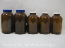Five Brown Glass Jars with Lids