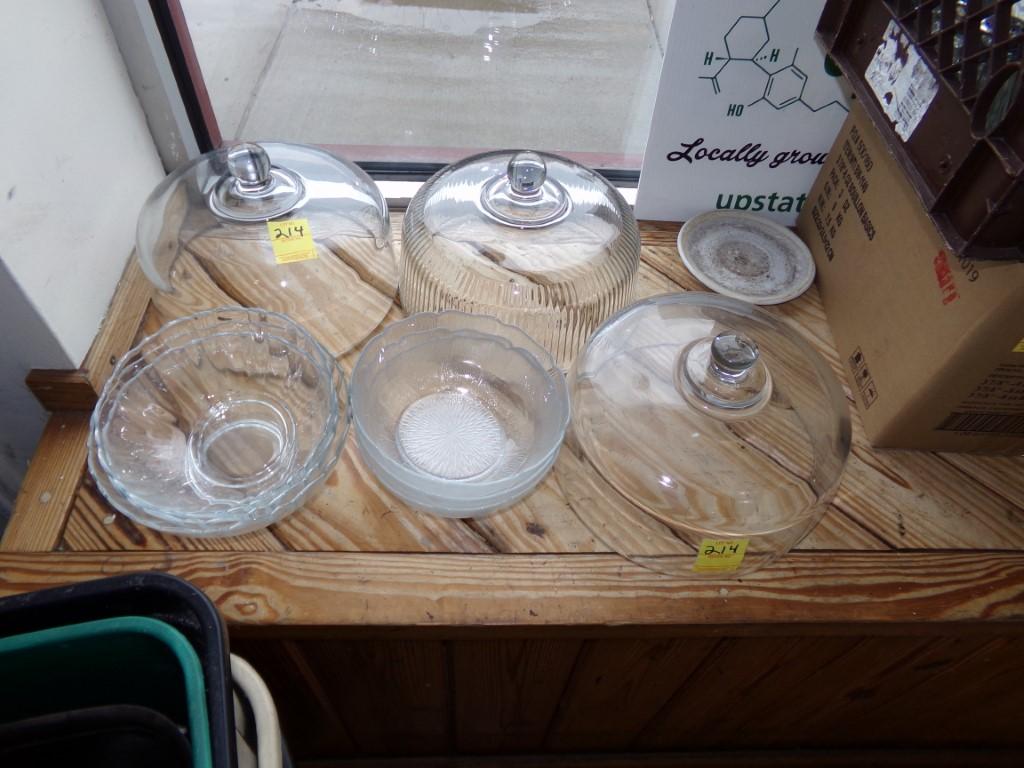 Group Of Clear Glass Bowls, Cake Covers, Etc., On Windowsill (Inside)