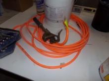 Orange Air Hose And A Hand Tubing Cutter (Production Shop)