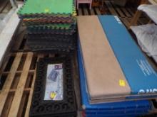 Stack Of Interlocking Floor Mats And Fold Out Wrestling Type Mats And Rubbe