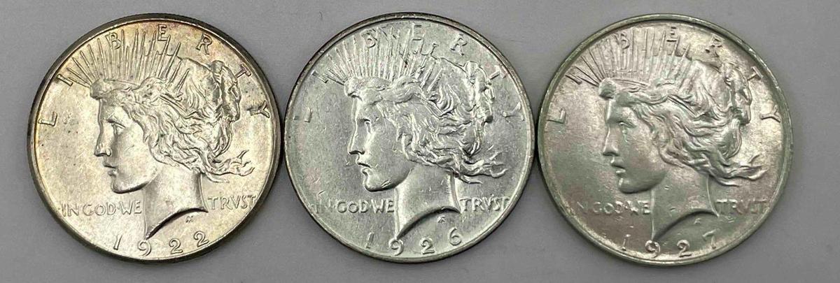 (3) Peace Silver Dollars. 1922S, 1926D, 1927D, all with PVC. (3 total)