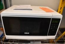 SMALL RCA MICROWAVE OVEN, WHITE, MODEL RMW733-B WITH