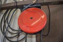 RED 25' RETRACTABLE THREE PRONG EXTENSION CORD