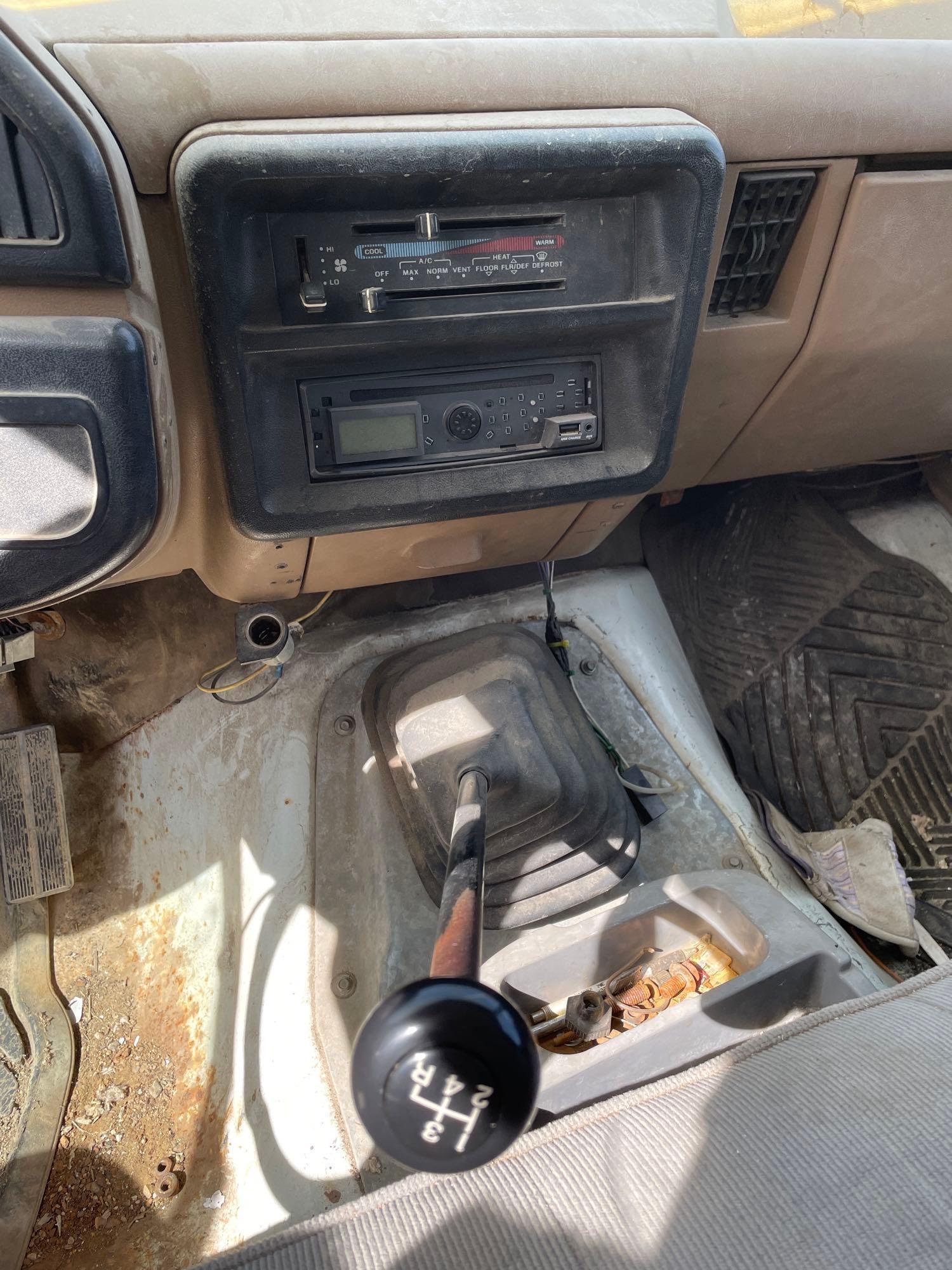 1989 Ford, F250 dually dump truck with V8 manual runs and drives