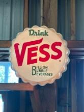 plastic Vess soda bottle top sign