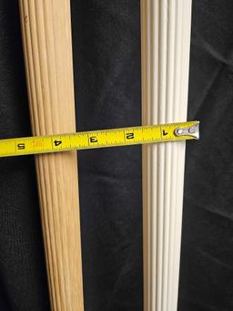 Long wooden drapery rods with hooks, wall brackets