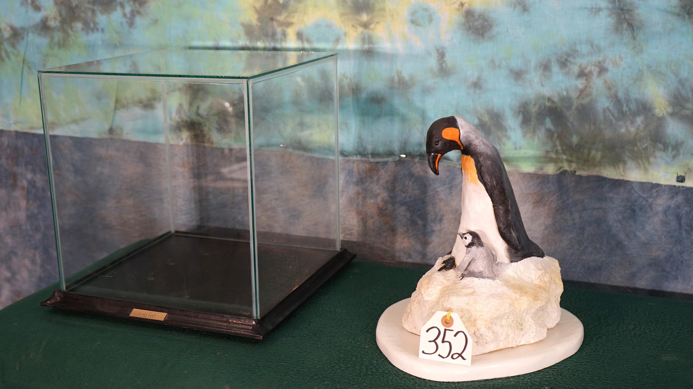 Sculpture of Mother Penguin with Baby called "Cold Feet"