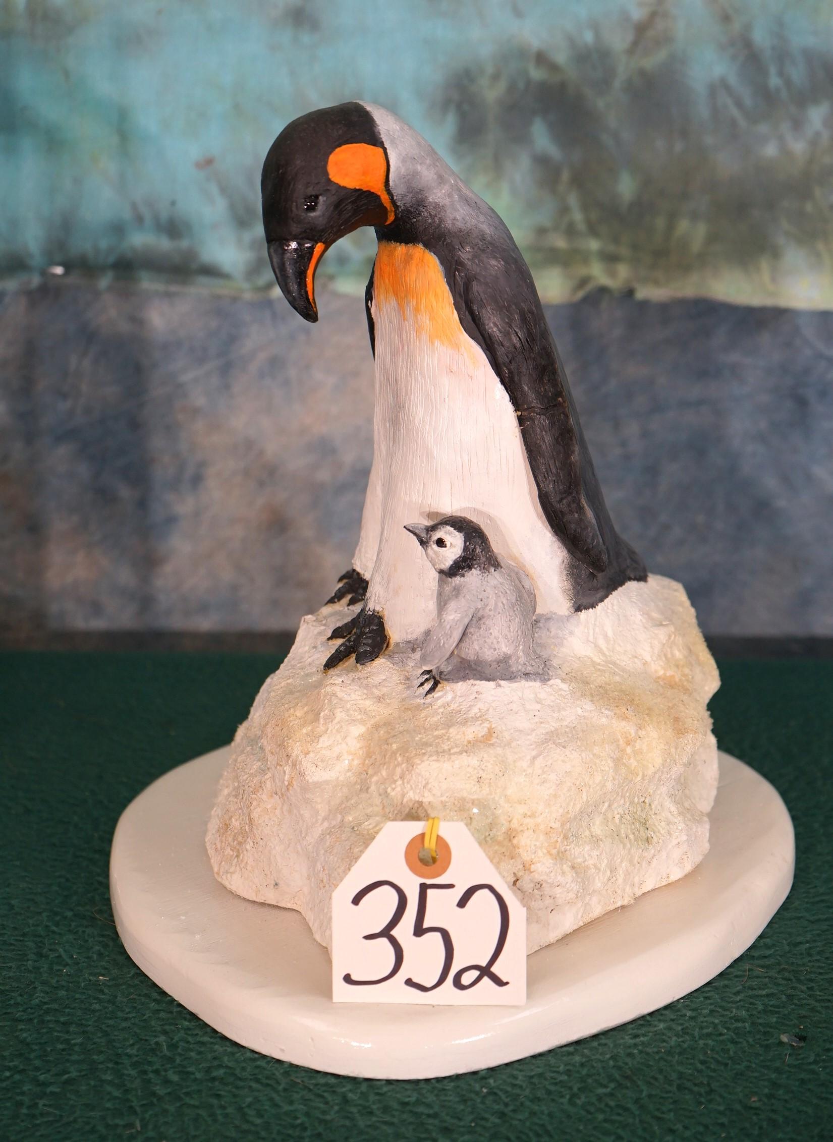Sculpture of Mother Penguin with Baby called "Cold Feet"