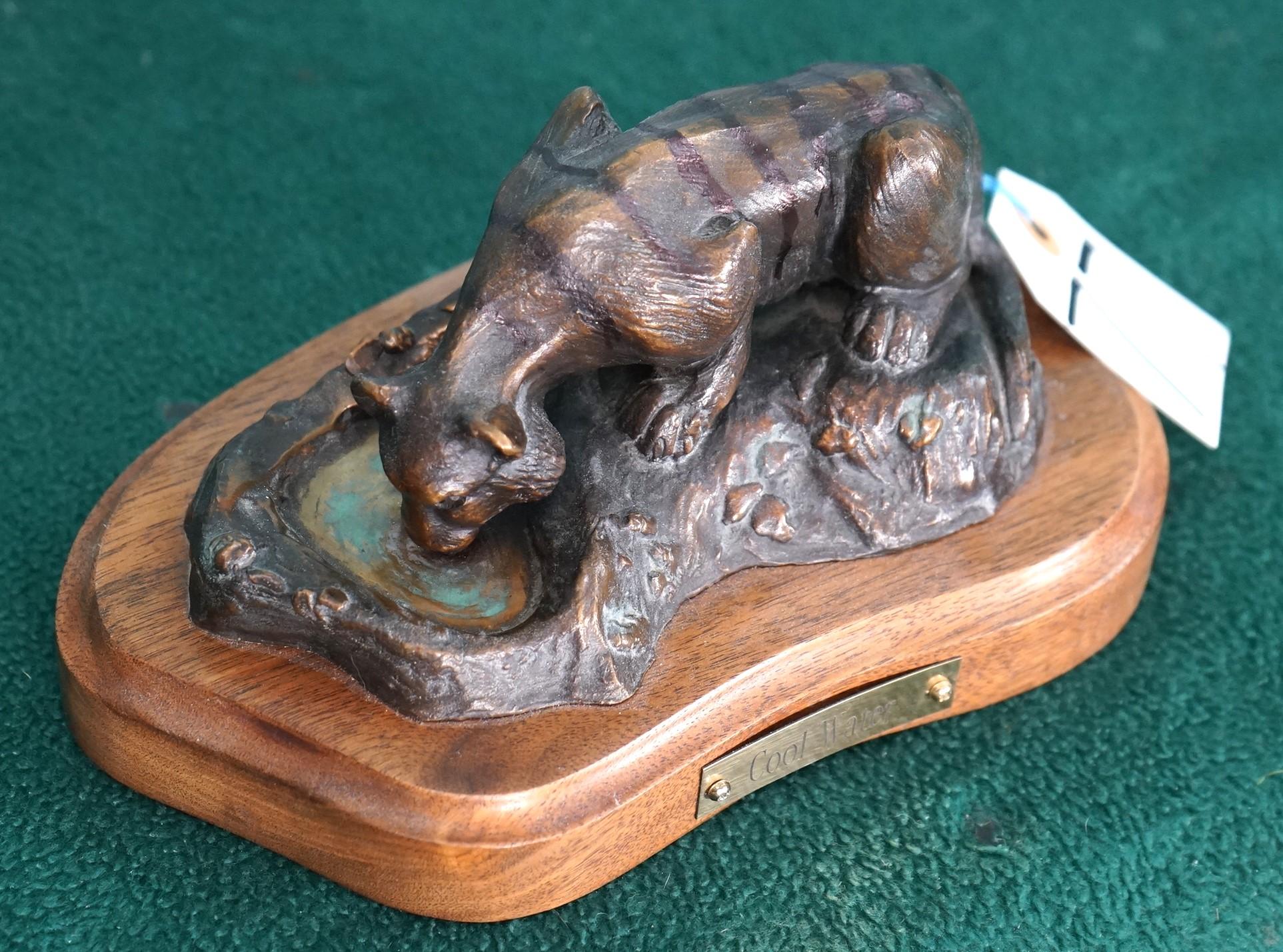 Bronze of a Tiger at a Water Hole  called "Cool Water" by Capt. John Brandt