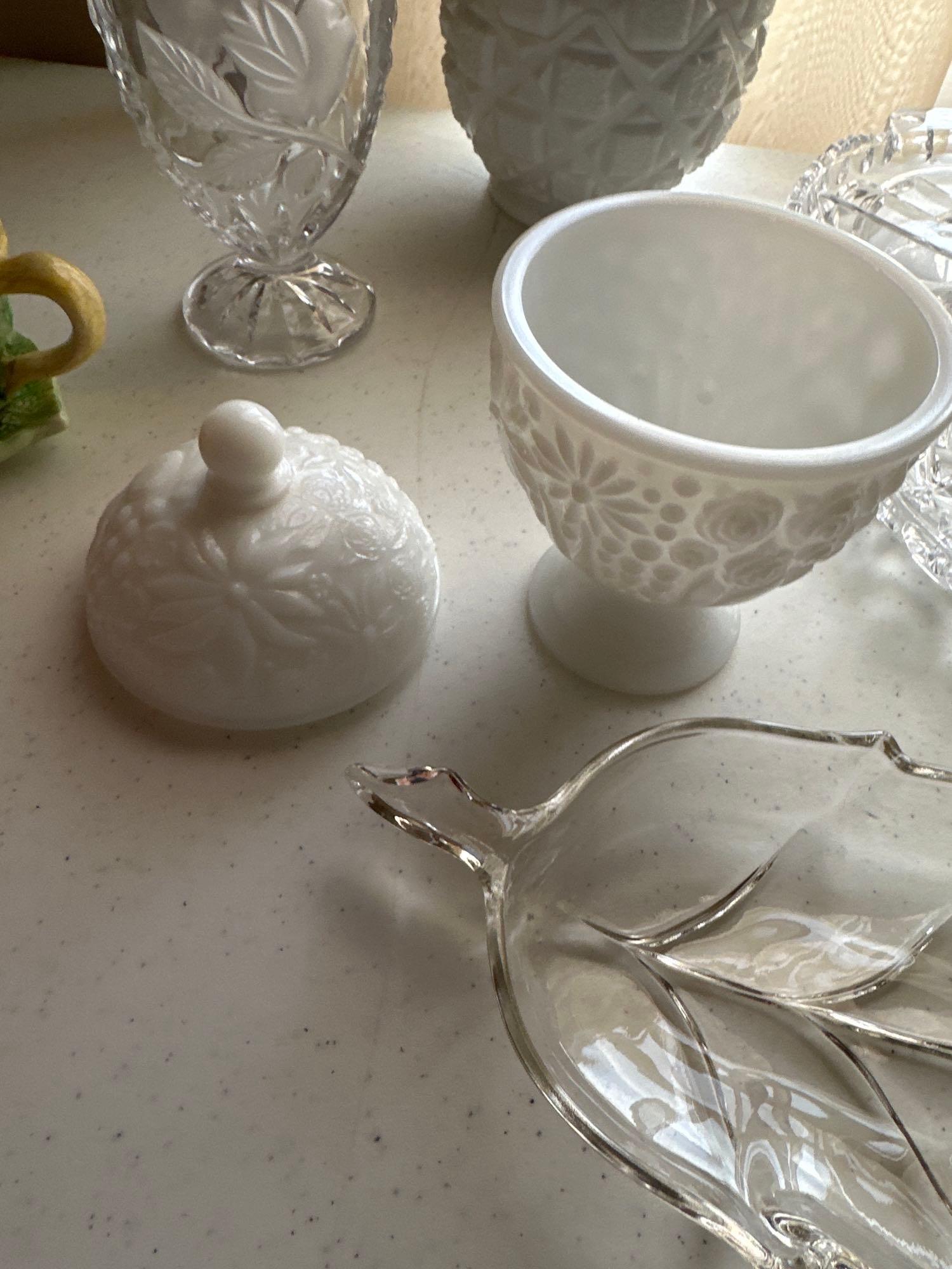 Various shapes of glass servers, milk glass candy dishes with lids.......Shipping