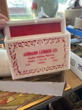 Ahmann Lumber Co. Remsen, Iowa letter holder, Remsen Telephone Co. ledger