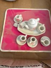 2 ceramic mini tea sets......Shipping