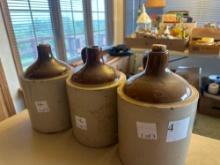 3 brown and tan crock jugs.