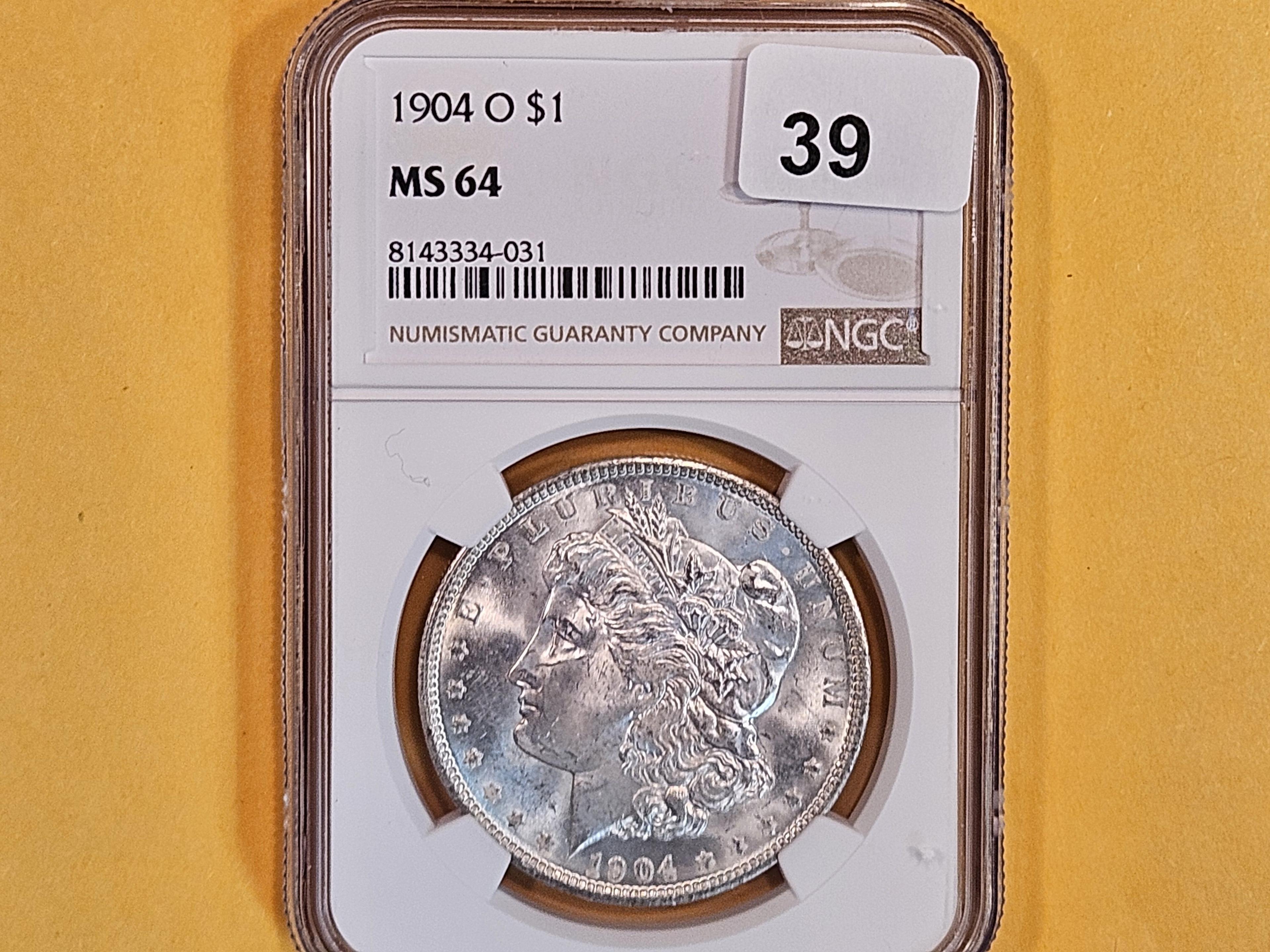 NGC 1904-O Morgan Dollar in Mint State 64