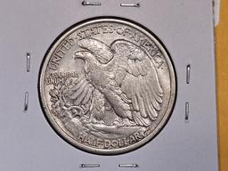 About Uncirculated plus 1936 Walking Liberty Half Dollar