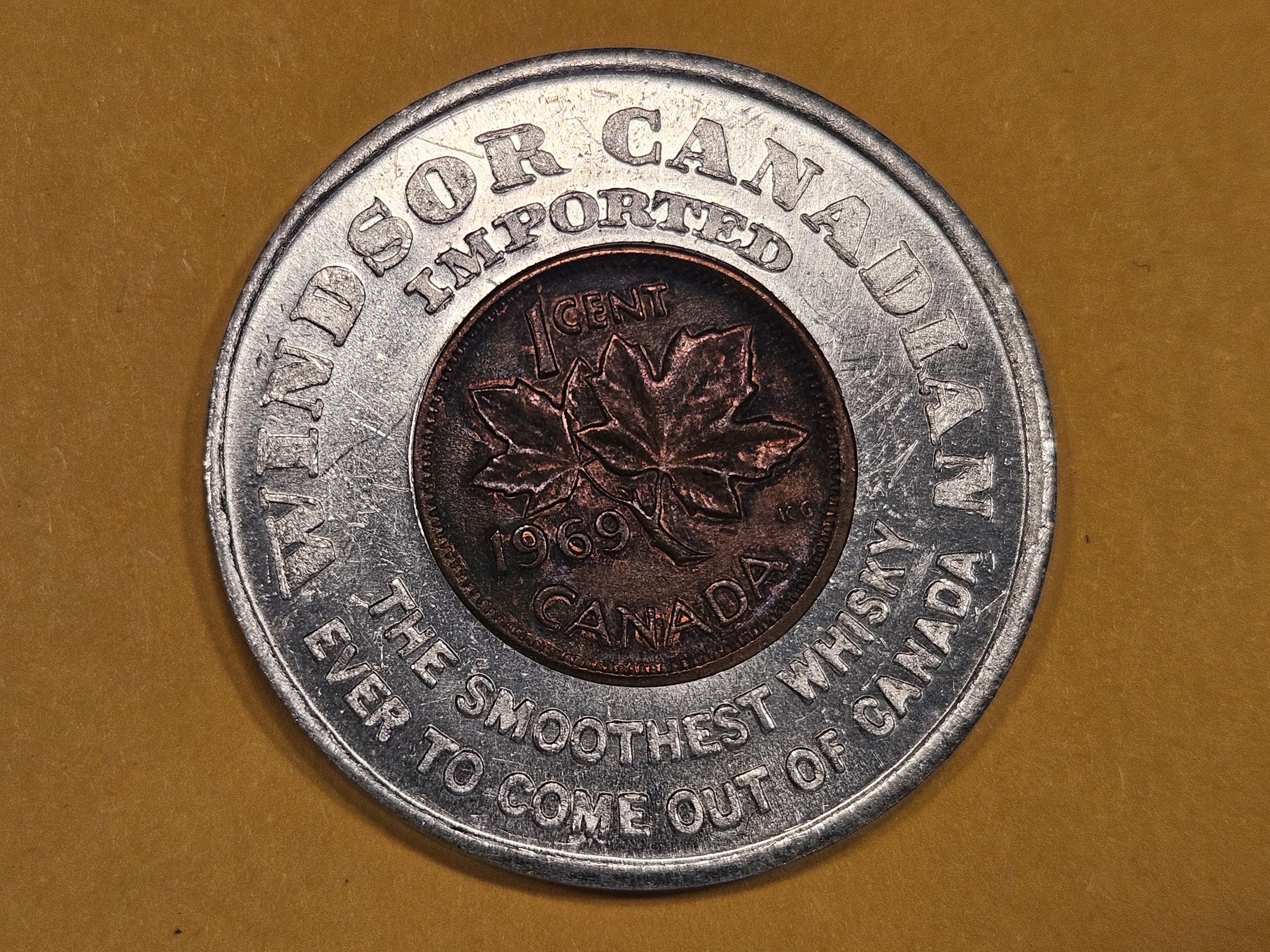 Two purty Canadian Encased Cents