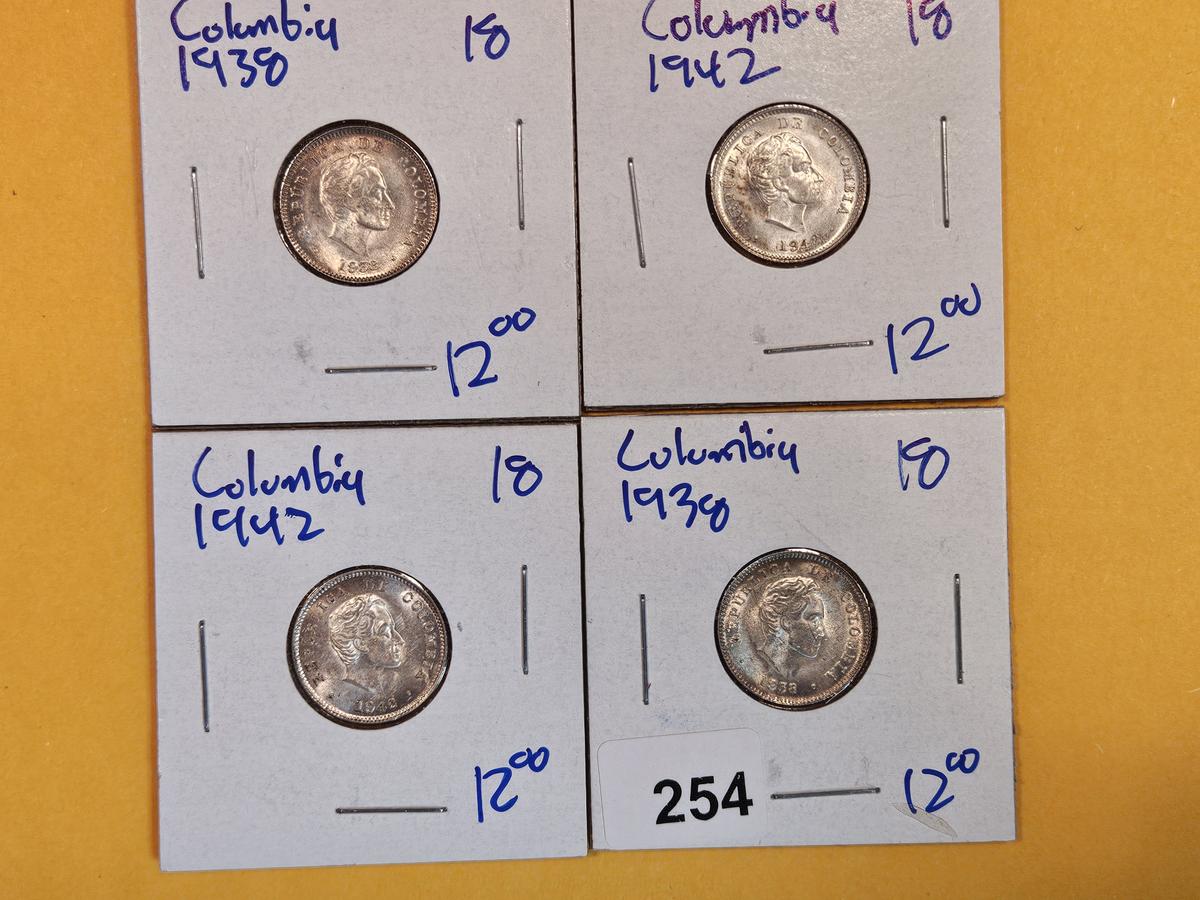 Four silver coins from Colombia