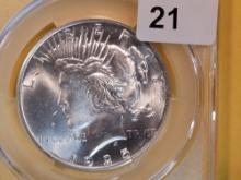 CAC 1925 Peace Dollar in Mint State 63