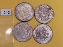 Four Morgan and Peace silver Dollars