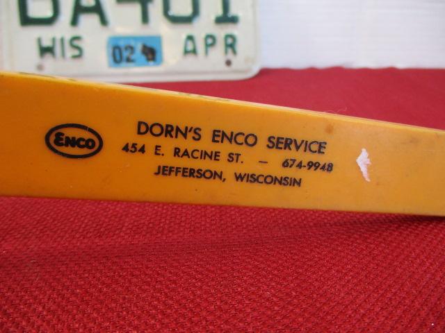Local Enco Service Station Advertising and Vintage Motorcycle License Plate