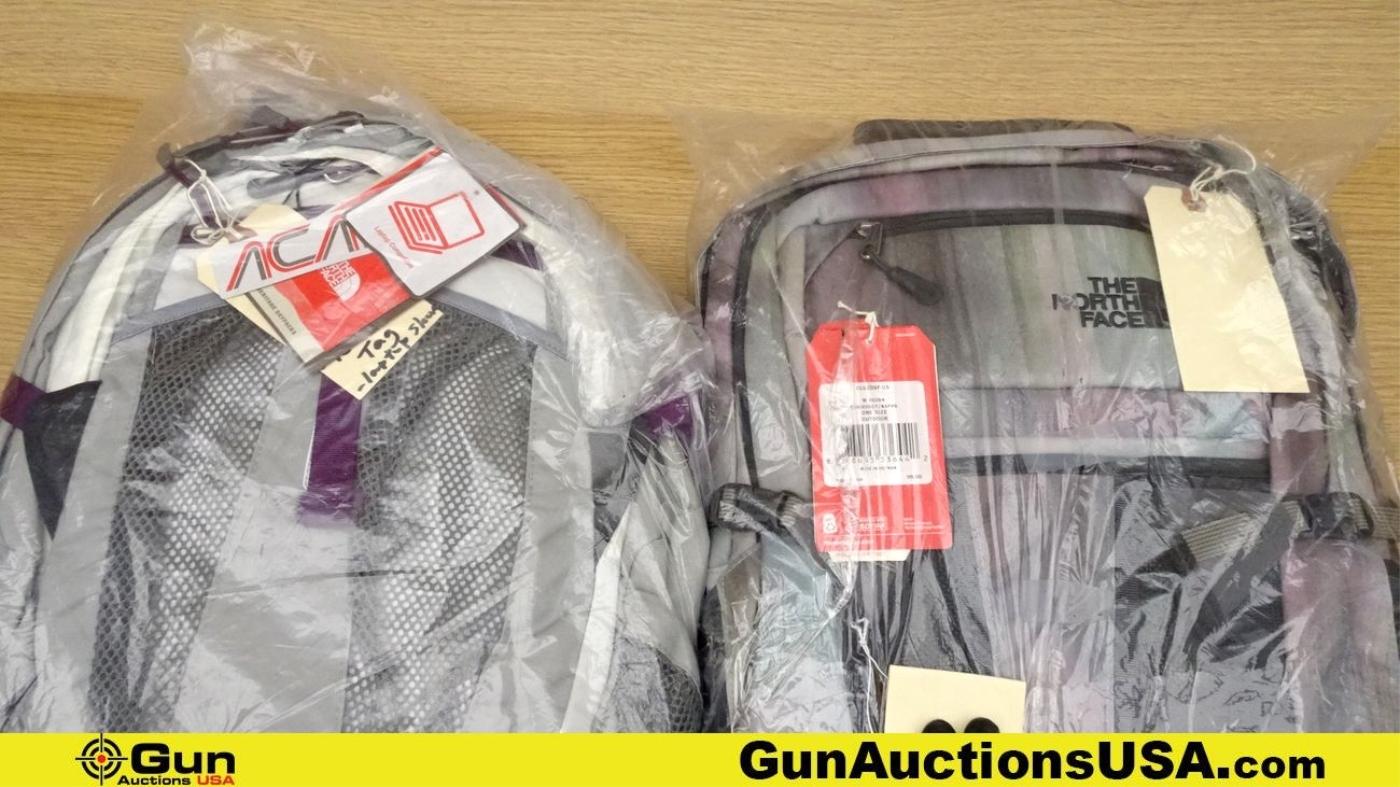 The North Face Recon Backpacks. Excellent. Lot of 2; 1-Grey/Purple, 1- Low Key Tie Dye.. (54461)