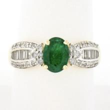 14k TT Gold 1.86 ctw Oval Prong Emerald w/ Baguette & Round Diamond Sides Ring