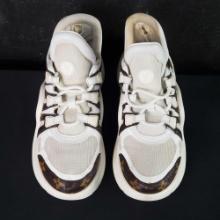 Pair of used womens Louis Vuitton tennis shoes size 8