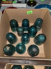11 Antique, Assorted Sized, Green Glass Insulaters.