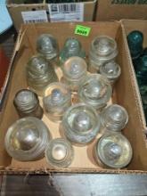 14 Antique, Assorted Sized, Clear Glass Insulaters.