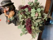 Clown and wagon with artificial flowers