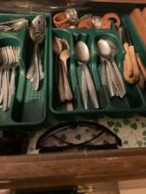 Silverware forks, spoons, butter, knife, steak, knives, and Leather napkin, holders, and sunglasses