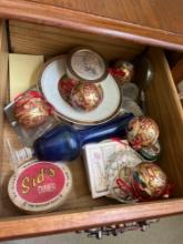 Some Christmas ornaments, a blue vase says, diner, coaster and more