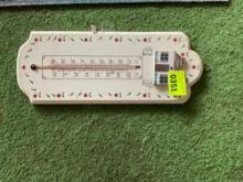 thermometer and welcome rug