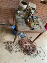 wooden cable variety of different kinds of tools, a pump, a plant pot and more