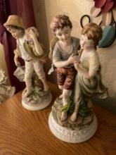 Boy and girl dancing figuring and young boy figurine