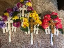 Very pretty flowers with Jesus on the cross made for memorial day I imagine