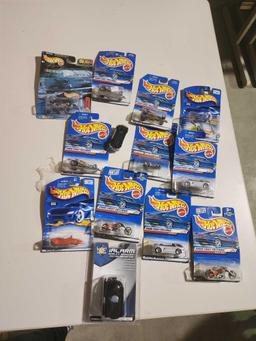 Box of Hot Wheels cars. New in packages.
