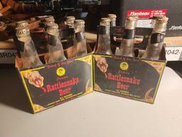 Two six packs of Rattlesnake beer bottles. Used.