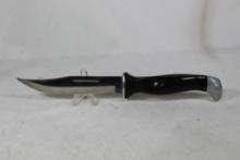 Cutco serrated sheath knife with 5.25 inch blade. Leather sheath. In original box. Appears as new