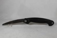 Gerber folding saw with 6.5 inch blade in original sheath in very good condition.