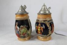 Two German beer steins. Small egg shaped.