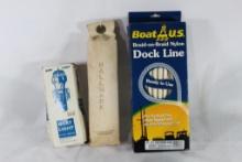 One mooring & dock line, one boat bow light. Both in packages and one canvas retrieving dummy, used.