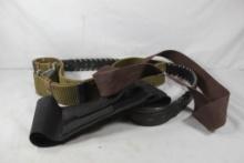 Three belts and one waistband holster. Used.