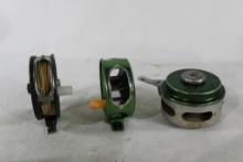 Three fly fishing reels. One automatic and two single strip. Used.