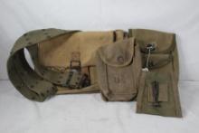 One web belt, one ammo pouch inside a canvas shoulder strap satchel. Used.